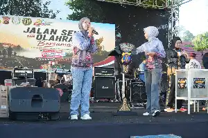 Pererat Sinergi dengan Masyarakat, Polres Kutai Kartanegara Gelar Jalan Sehat Hari Bhayangkara ke-80