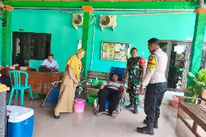 Sinergi Polsek Balerejo: Dampingi Layanan Kesehatan Posbindu dan Donor Darah di Desa Sogo