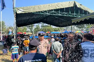 Polsek Ponggok Kawal Kemeriahan Mancing Gratis dan Hiburan Musik di Sidorejo Blitar