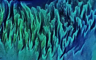 Potret Satelit Ungkap Keindahan Geologis Dasar Laut Bahama yang Menyerupai Karya Seni