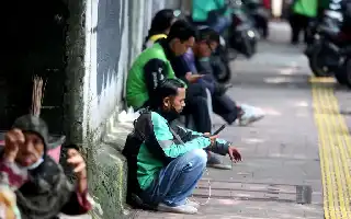 Polemik Status Pengemudi Ojol sebagai Pelaku Usaha Mikro: Antara Pemberdayaan dan Perlindungan Kerja