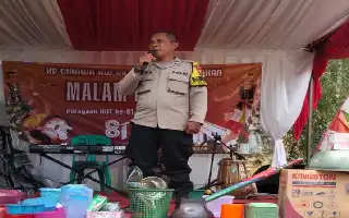Pastikan Keamanan Puncak HUT RI di Bandung Barat, Bhabinkamtibmas Cirawamekar Turun Langsung