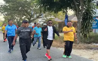 HUT Bhayangkara ke-80, Polres Pelalawan Gelar Jalan Santai dan Bakti Sosial Bersama Warga