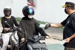 Peringati Hari Lahir Kejaksaan Ke-81, Kejati Jambi Bagikan 4.000 Masker dan Layanan Kesehatan Gratis